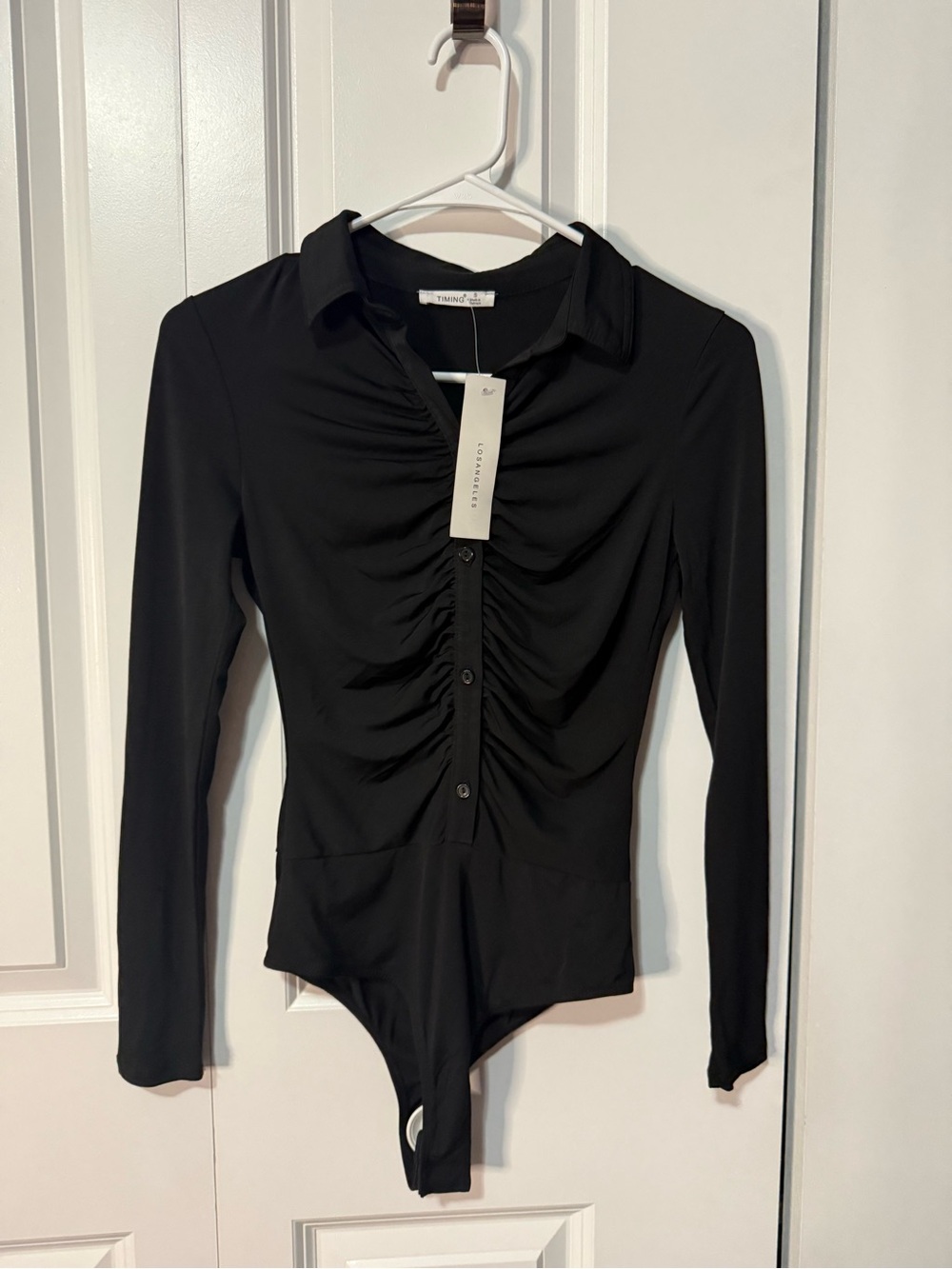 Timing Black Long-Sleeve Ruched Button Bodysuit